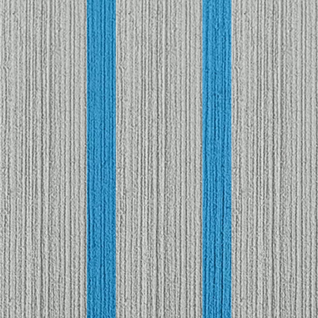 Close-up of light grey foam with light blue groove accents