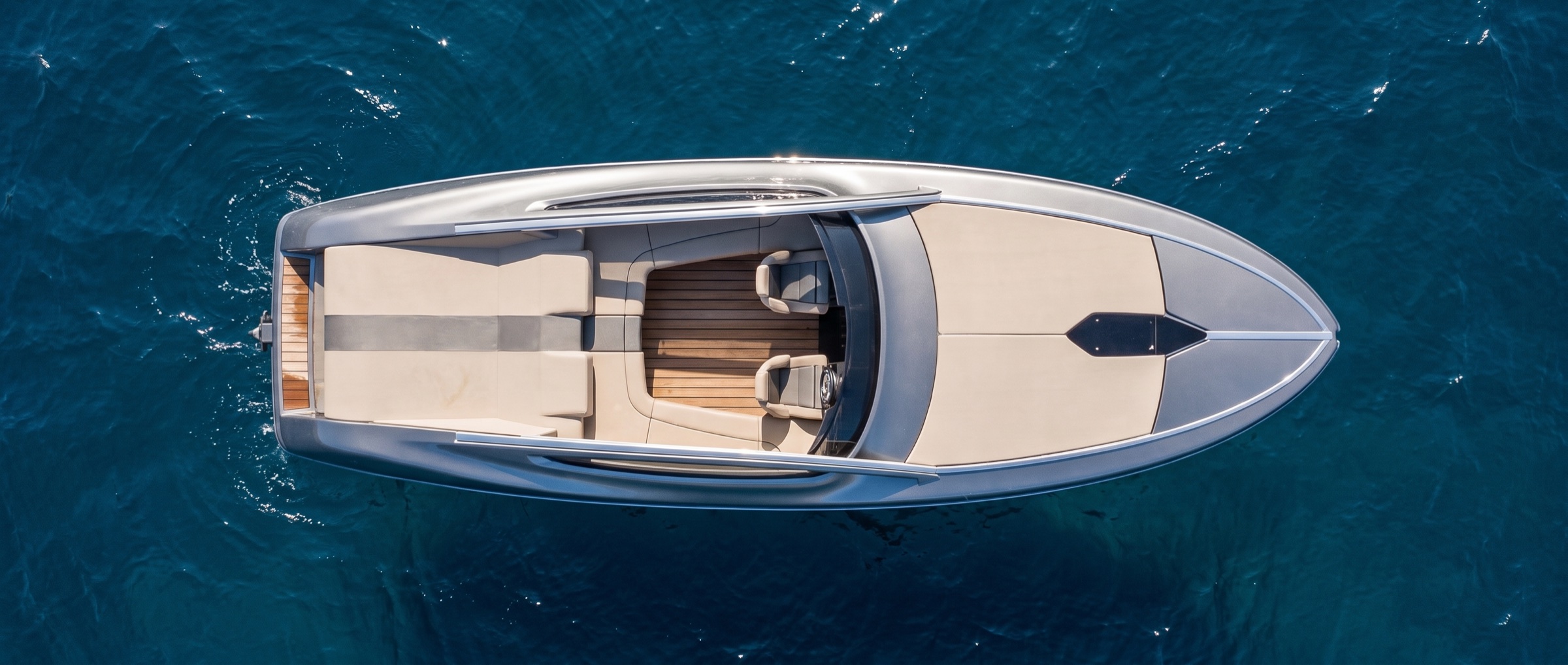 Overhead view of a boat on open water, being captured for a 3D scan
